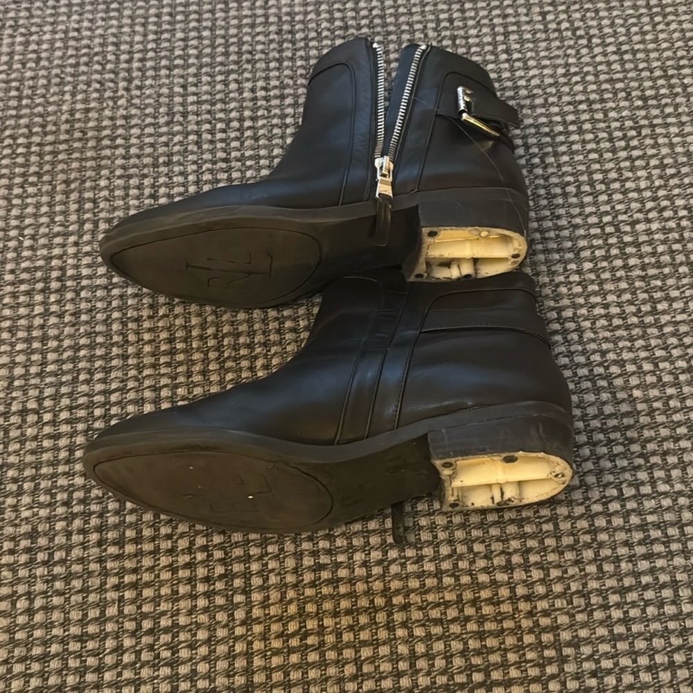 Black boots. Broken in the heel. Size 7